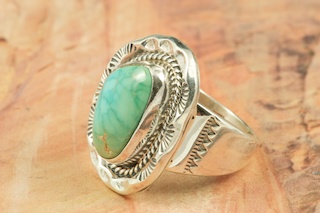 Genuine Crow Springs Turquoise set in Sterling Silver Ring. The Crow Springs Mine is located near Tonopah, Nevada. Created by Navajo Artist Wilson Padilla. Signed. 